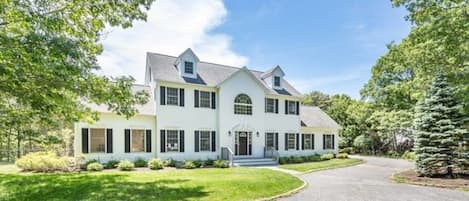 A curved driveway leads up to our house in the private cul-de-sac community.