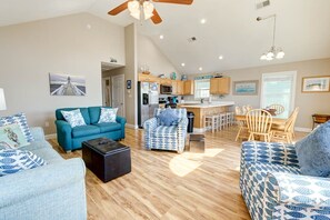 Top-Level Living Room with Deck Access