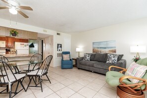 Open concept living space with cozy furniture and new updates