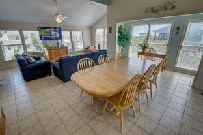 Top-Level Living Room with Deck Access ** The high chair seen in photos is no longer at the property. If baby equipment is needed local rental options can be provided. **