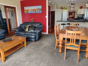 Open plan lounge dining, and kitchen.