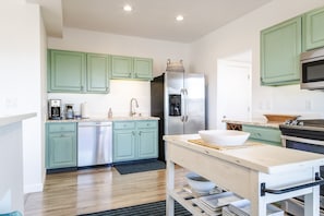 Kitchen—Fully stocked with spices, oil, and vinegar for your cooking needs.