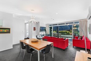 Dining area with open plan living and gas fire