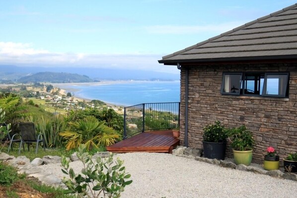 Studio, parking bay, deck and view