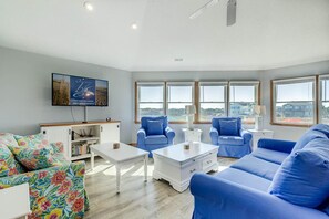 Top-Level Living Room with Deck Access
