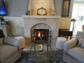 Ahh. the fireplace with the swivel rocker chairs. Flip a switch to light fire!
