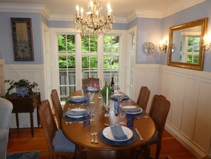 This lovely dining table has 2 leaves for expansion if you want to throw a party