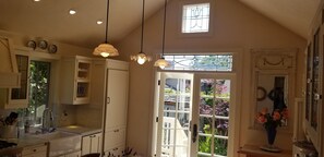Kitchen has fabulous colorful prism lights from the beveled glass in the windows