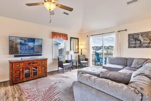 Top-Level Living Room with Deck Access