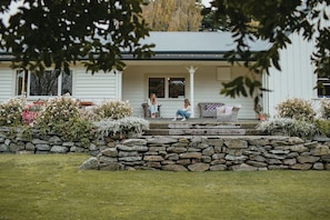 Relax on the front verandah overlooking the garden