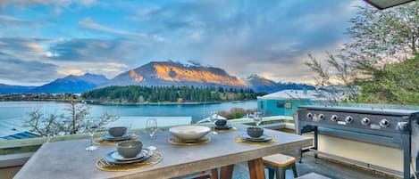 Outdoor dining area with BBQ and stunning views