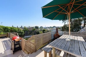 Elevated deck overlooking backyard 