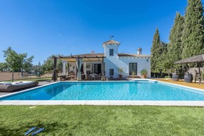 Property building,BBQ facilities,Garden,Pool view,Swimming pool