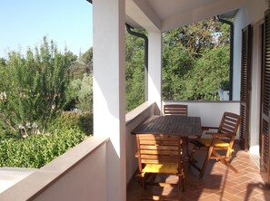 One of the terraces with the dining table.