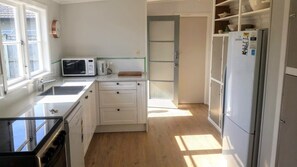 Kitchen looking toward back door.