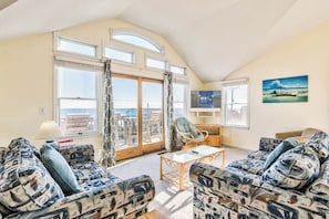Top-Level Living Room with Deck Access