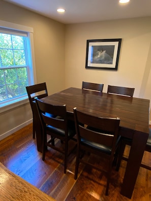 Dining table expands to seat eight. 
