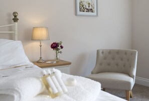 First floor: Bedroom one with boutique style furnishings