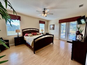 Spacious Master Bedroom with King bed with smart TV

