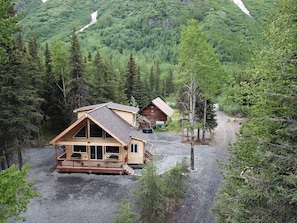Front, aerial view of the cabin. Upper Paradise Log Cabin is in the background.