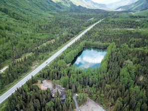 Aerial view of the property showing the Moose Pass Swimming Hole.