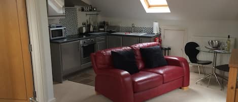 Open plan living cook,dine then relax on the cosy sofa and watch TV or a DVD.