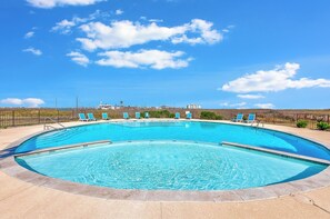 Savor your vacation time poolside, relax in one of the loungers and listen to the sounds of the waves