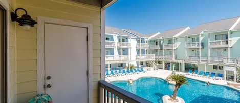 Private balcony from living area over looking the pool