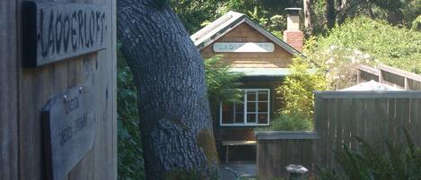 view from front gate to cottage