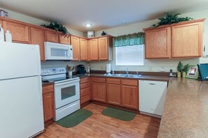 Open kitchen. We provide all the utensils, pots/pans, you could ever need!