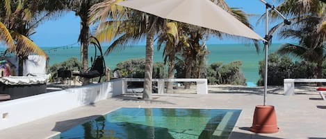 View from terrace to the pool and ocean