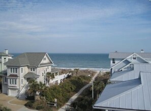 A view from the widow's walk on top of the house.  Picnic table located on deck.