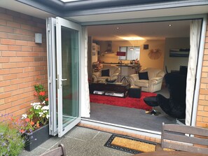 Bifold doors onto private courtyard and section