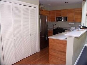 Kitchen with dishwasher and washer/dryer.  