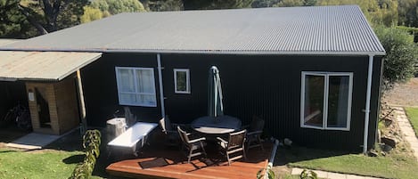 Relax in the outdoor bath under the stars after having a sauna.