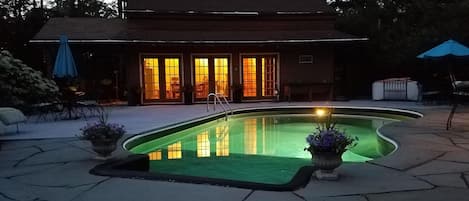 Poolhouse view at night