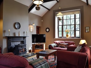 Living room with wood burner | The Old School Penallt, Penallt, near Monmouth