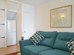 Comfy seating within living area | Rock Cottage, Ardentinny, near Dunoon