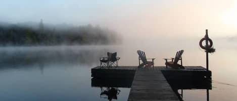 Only 1 other small cabin on this 87 acre spring fed lake with no public access.