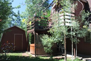 Our hot tub, hidden below the balcony with plenty of privacy