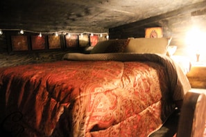 Queen bed in loft (low ceiling).