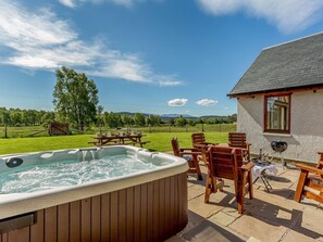 Inviting, private hot tub | Sunnyside House, Carrbridge, near Aviemore