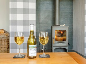 Stylishly furnished living room with wood burner | Sunnyside House, Carrbridge, near Aviemore