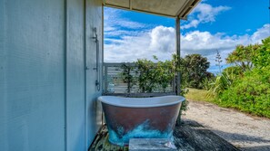A favourite for our guests - the deep outdoor tub that fits two.  