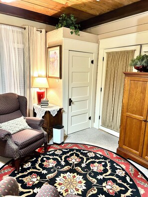 Closed door on left is coffee bar area & door on right to large private bathroom