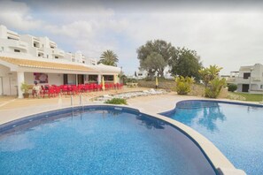 Lovely swimming pool  just steps  from the patio !