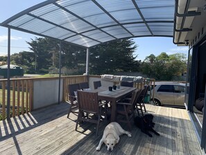 Archgola provides shelter and shade over part of the front deck 