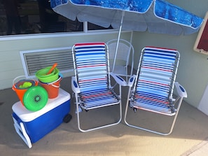 2 chairs, Umbrella... this will save you $40 a day when traveling to beaches!
  