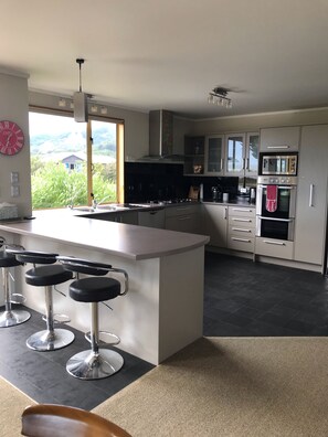 Well equiped spacious kitchen