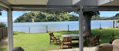 waterfront relaxation on the covered deck